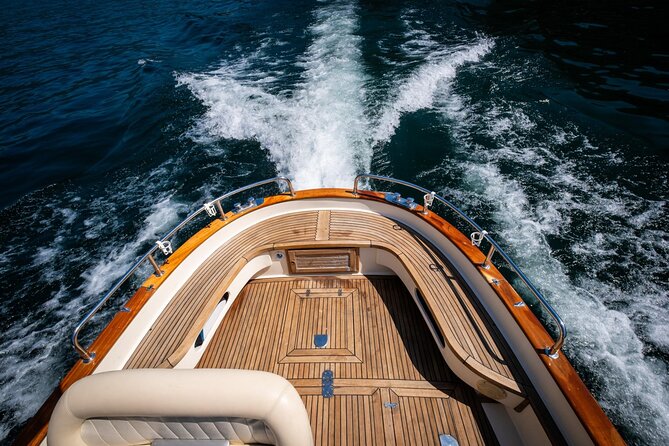 1H Private Cruise on a beautiful wooden speedboat on Lake Como - Cernobbio brings famous names into view
