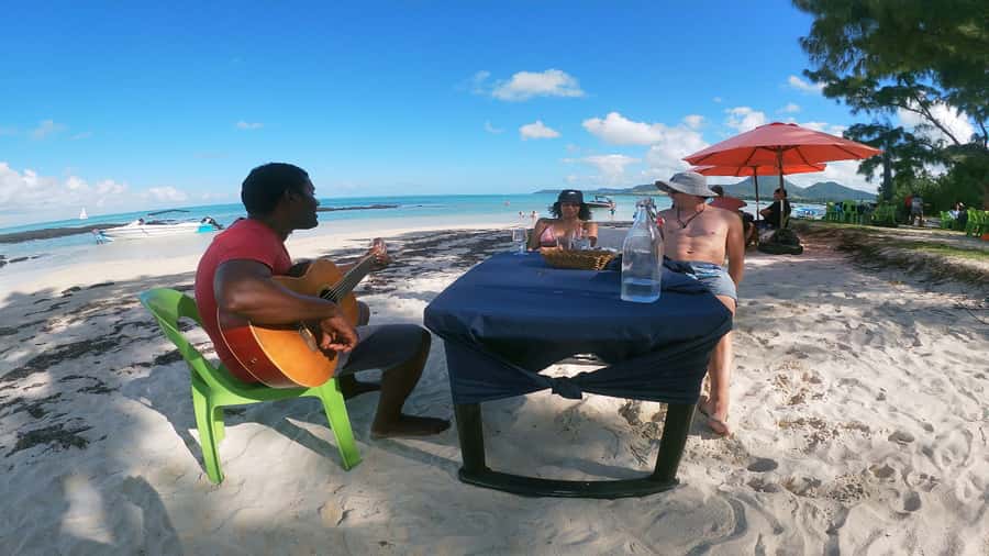 5 Islands Speedboat w/Snorkeling Sea Turtle + Lunch & Drinks - Leaving Trou d’Eau Douce on a small speedboat