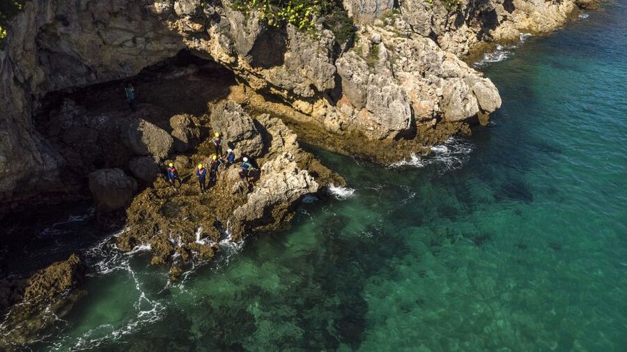 Arrábida: Setubal, Sesimbra Coasteering & Speedboat Tour - A speedboat start at Creiro Beach