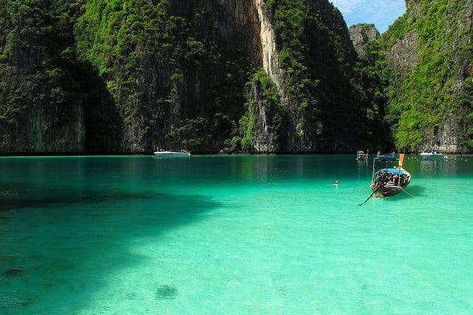 Beat the Crowds: Earlybird Phi Phi Islands by Speedboat - Phi Phi Lee and the limestone cliffs