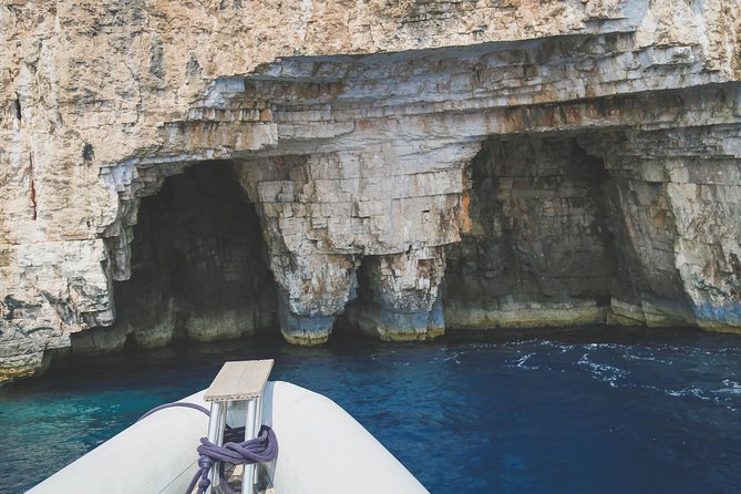 Blue Cave & 6 Islands Speedboat Tour From Split or Podstrana - Komiža gives the day a slower start