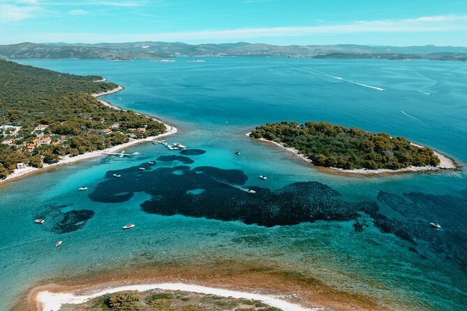 Blue Lagoon & 3 Islands Small-Group Speedboat Tour - Maslinica on Šolta: a slower hour by the water