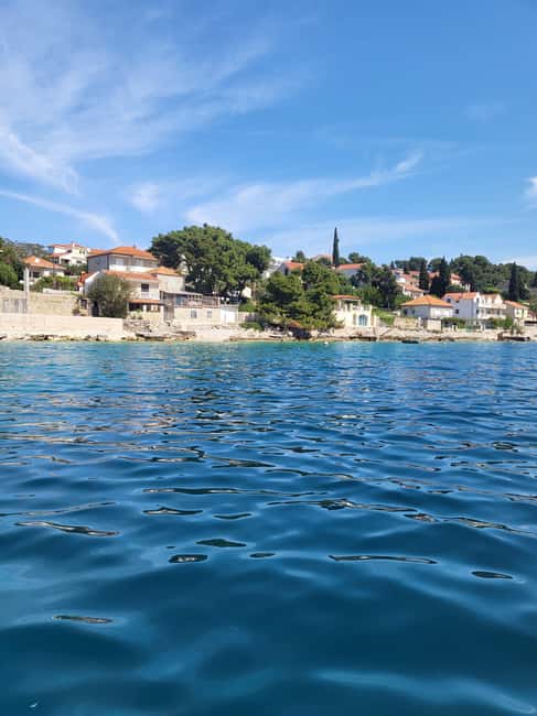 Blue lagoon with a speed boat water and towels included - The ride back to Split