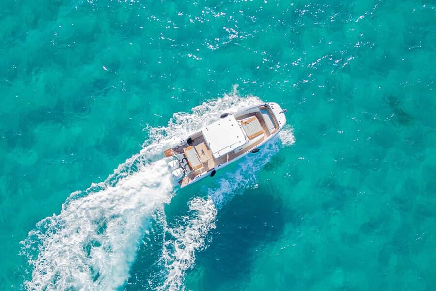 Cagliari: Luxury Motorboat Tour with 3 Swim Stops & Wine - Wine, water, and what to bring