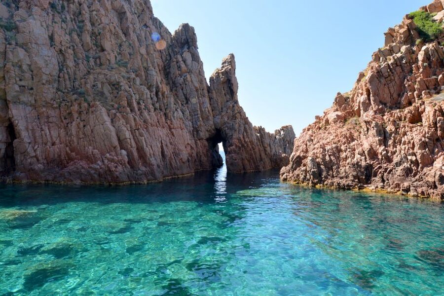 Cargèse: Calanques of Piana Capo Rosso Semi-Rigid Boat Tour - Leaving the port beneath Cargèse Cemetery