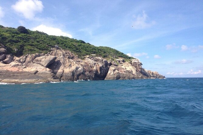 Cham Island Snorkeling - Wonderful Beach - Speedboat Daily Tour - Beaches, coconut trees, and a slower island hour