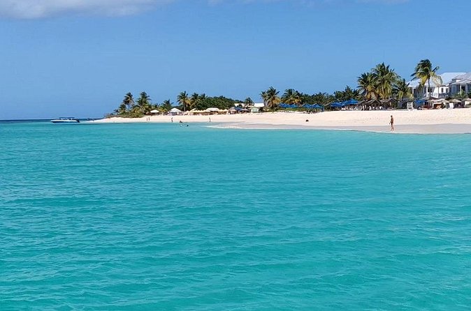 Charter our boat is a private power boat charter. - Beach stops around the island