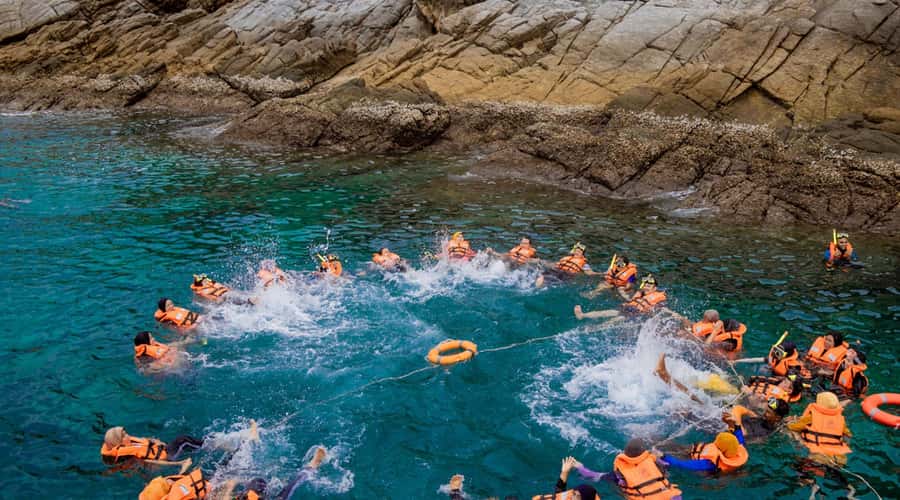 Coral and Racha Island Tour by Speed boat - Coral Island: beach time, swimming, and optional sea sports