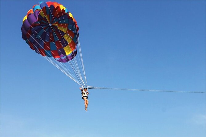 Coral Island speed boa-Parasailing and others activities choice - Snorkeling, jet skiing, and the water-sports question
