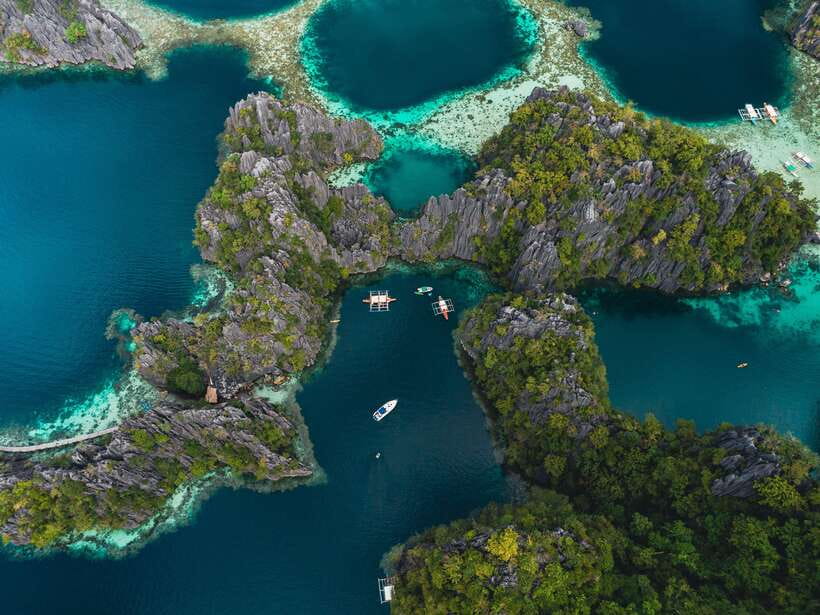 Coron: Private Island-Hopping Tour on a Yacht or Speedboat - A private start from Coron Harbor Square