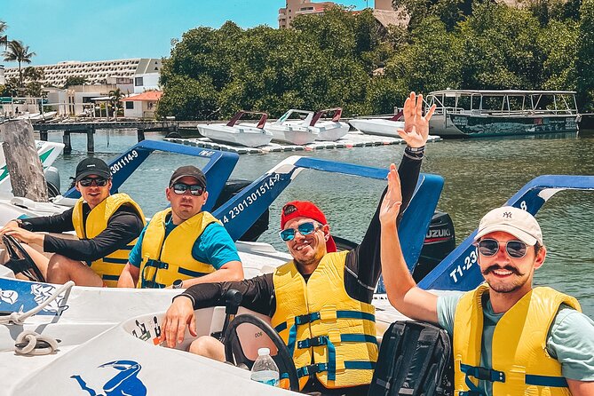 Drive an Speedboat + Mayan Ritual + Food Tasting and More! - Snorkeling among fish and coral