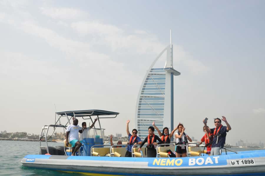 Dubai: Guided Speedboat Tour with City Sights & Ice Cream. - Palm Jumeirah and Atlantis from the water