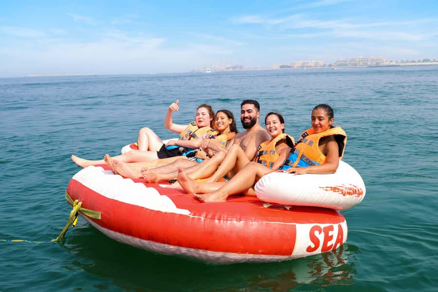 Dubai: Speedboat-Pulled Donut Ride Trip in JBR - Sitting on the donut tube