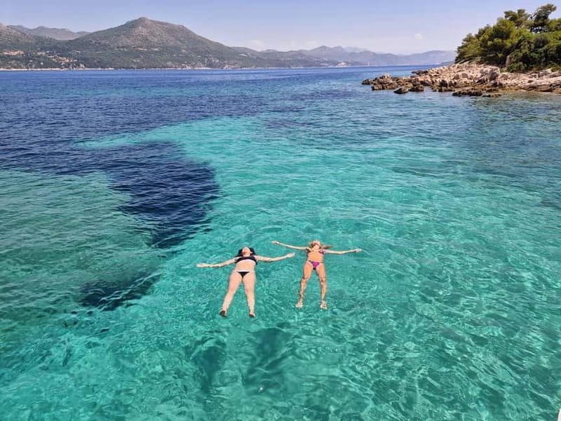Dubrovnik: Blue Cave, Green Cave & Sunj Beach Speedboat Tour - Entering the Blue Cave on Koločep