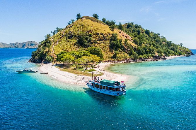 Exclusive Early Bird Komodo Tour: Beat the Crowds by Speed Boat - Pink Beach combines a quick swim with bright coastal scenery
