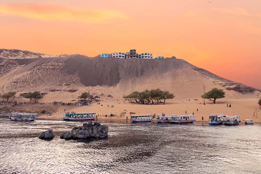 From Aswan: Philae Temple & Motorboat Tour to Nubian Village - Souvenirs, tea, and the limits of an arranged village visit