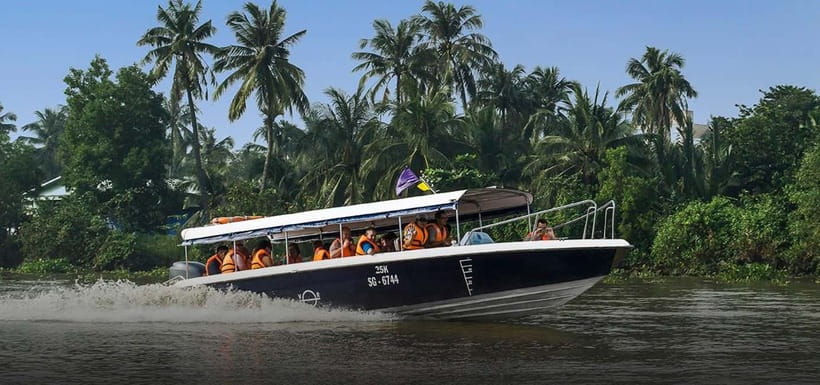 From HCM: Cu Chi Tunnels Half-Day Tour by Speedboat or Bus - Crawling through the narrow tunnels