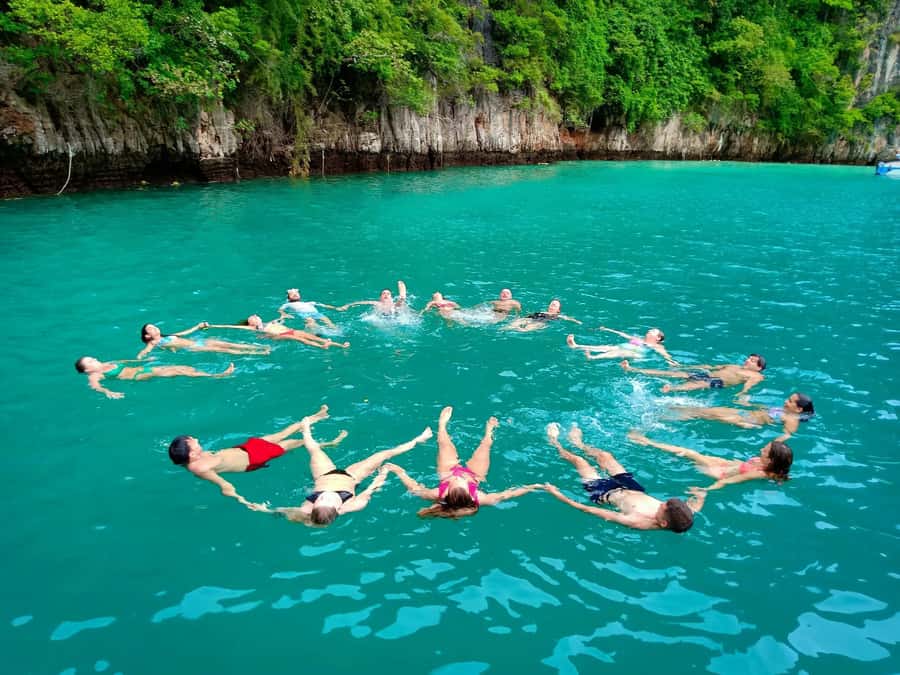 From Krabi: Phi Phi Early Bird & 4 Islands by Speedboat - Chicken Island and Poda Island finish the route