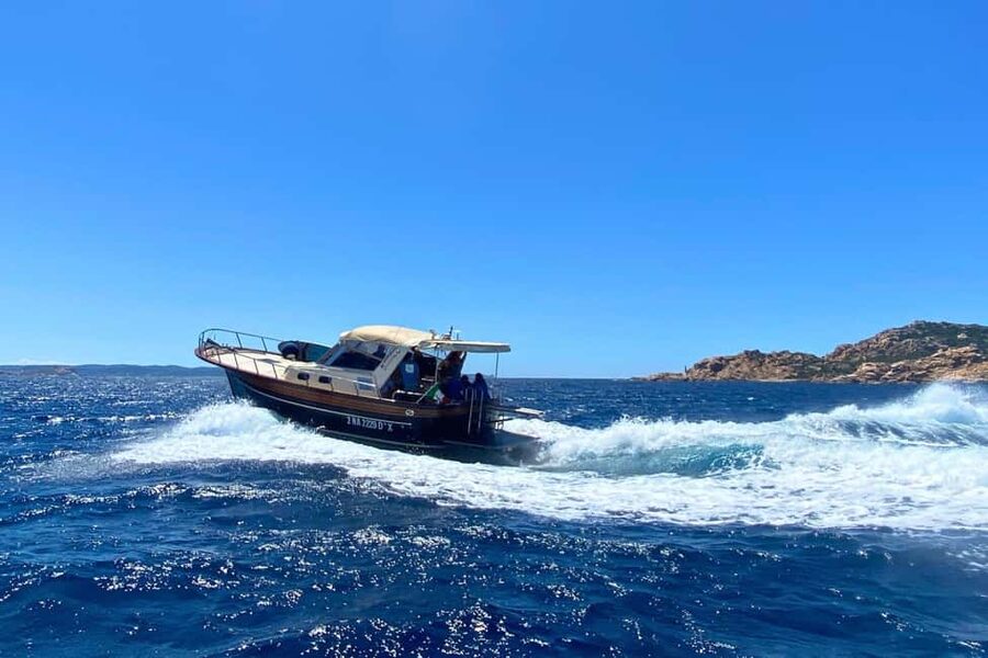 From Palau: South Corsica Trip by Wood Speedboat with Lunch - Isola Piana and a long lunch onboard