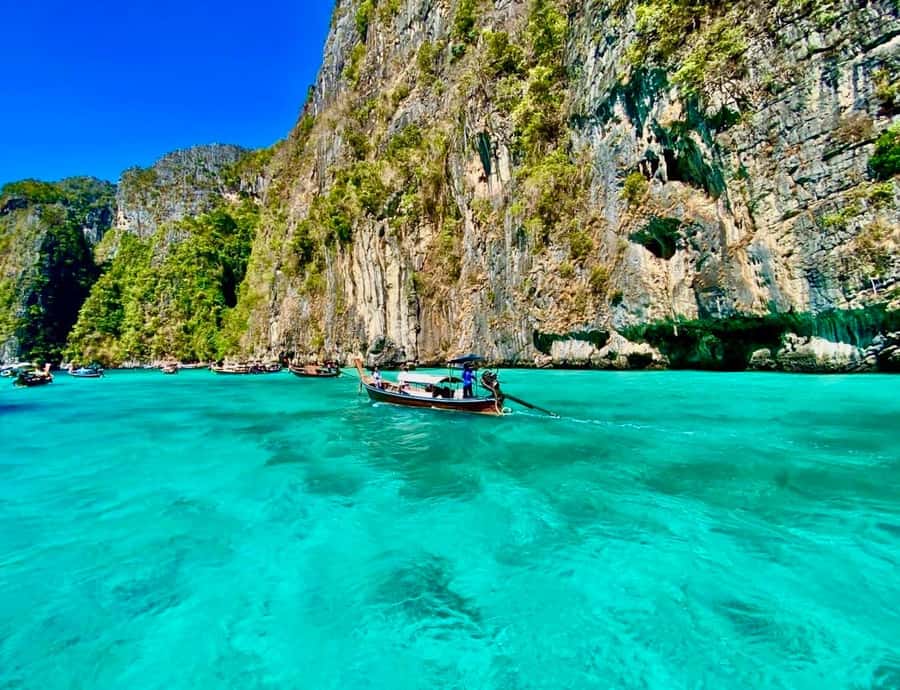 From Phi Phi Don:Sunset and Plankton Snorkeling by Speedboat - Swimming in Pileh Lagoon