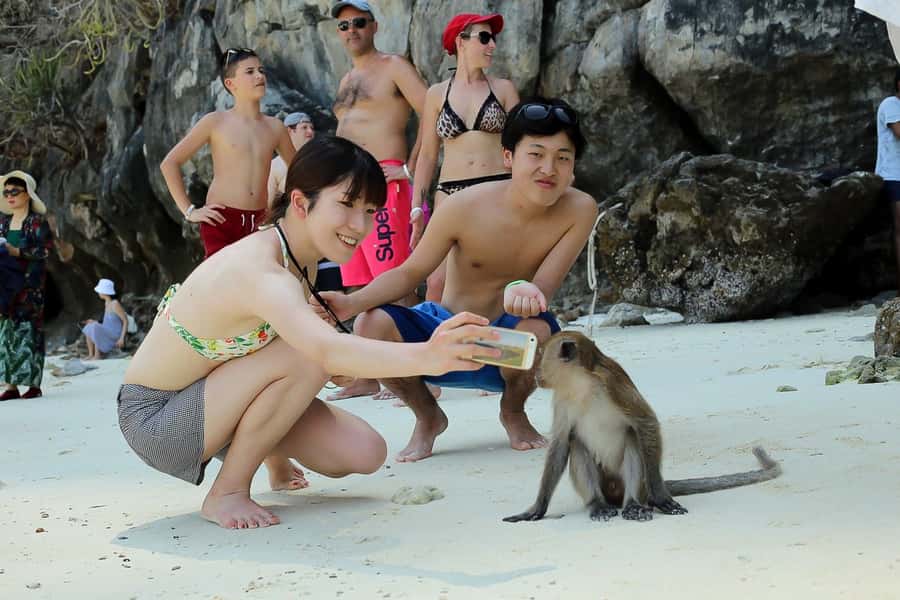 From Phuket: Phi Phi and Maya Bay Snorkeling by Speedboat - The crew, guide, and onboard photographer