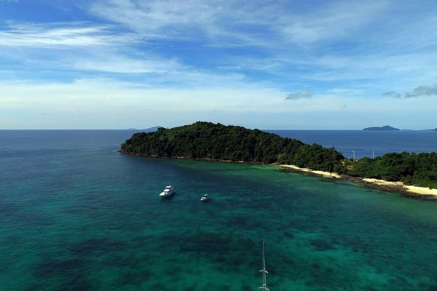 From Phuket: Phi Phi Island Private Full-Day Speedboat Trip - Bamboo Island: your first swim and beach stop
