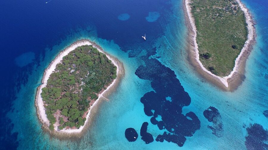 From Split: Blue Lagoon and Trogir Half-Day Speedboat Tour - Trogir: One Hour in the Stone Streets