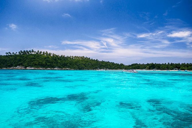 Full Day Coral Island Tour With Banana Boat By Speedboat From Phuket - Snorkeling around the reef