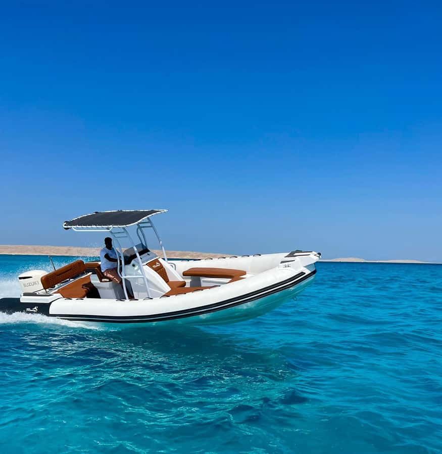 Hurghada : Sunset & Barbecue at Magawish Island By Speedboat - From Hurghada hotel to the harbor