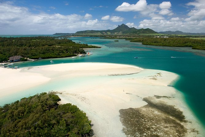 Ile aux Cerf: Speed boat with Parasailing & Tube Riding and Lunch - Parasailing over the east-coast lagoon