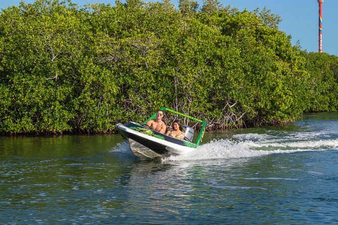 Jungle Tour adventure Cancun Speed Boat Through Mangrove - Taking the helm at Marina Chac Chik