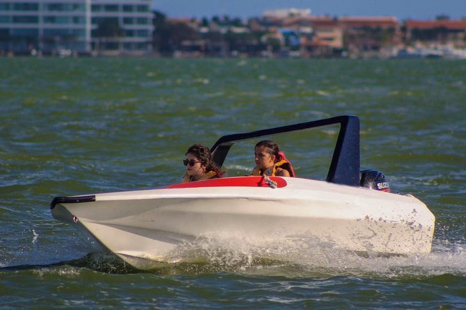 Live the experience of driving an Speedboat & Snorkel in CANCUN - From Cancun’s hotel zone to Nichupté Lagoon