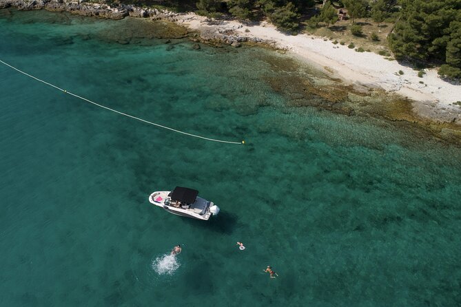 Luxury Speedboat Island Hopping with Swimming & Snorkeling - Leaving Rovinj and seeing the old town from the water