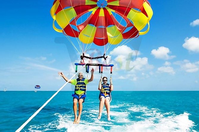 Marvelous Ile aux Cerf island: Speed Boat, Parasailing, Lunch & GRSE waterfall - Who gets the best value at $138.60?