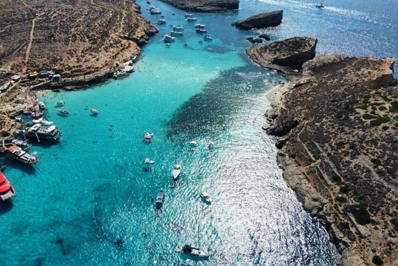 Mellieha: 1:00pm Speedboat round Comino Caves 2h Blue Lagoon - Walking near Santa Marija Tower