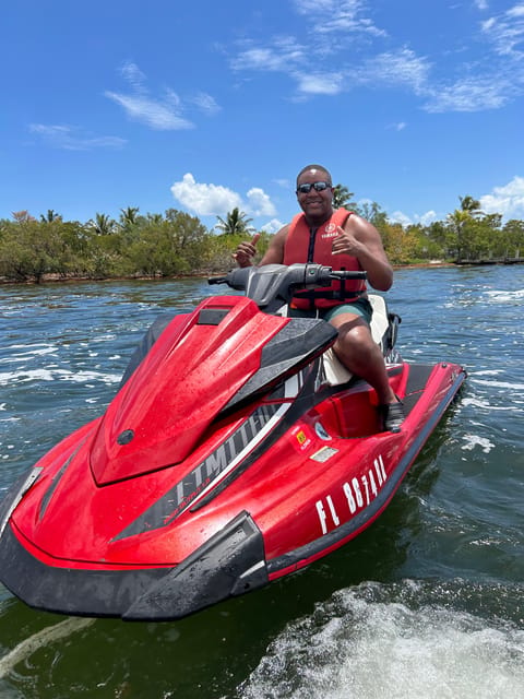 Miami: Jet Ski Adventure with Complimentary Speed Boat Ride - What to bring for a wet, sunny hour