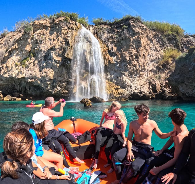 Nerja-Maro: Snorkeling & Sea Scooter Speedboat Trip - Snorkeling with a guide nearby