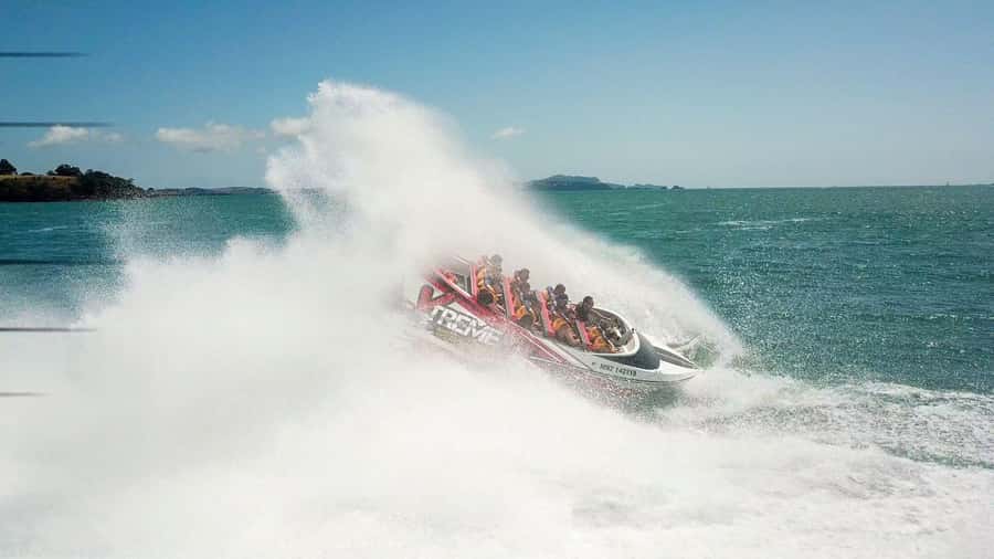 Paihia: Bay of Islands 30-minute Adventure Jet Boat Trip - Safety gear and the guide on board