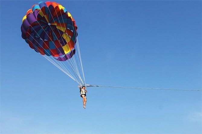 Pattaya: Koh Larn Speedboat Tour with Thai Lunch and Transfers - Koh Larn beach time and optional water sports