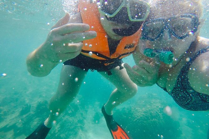Phi Phi Don & Phi Phi Leh Sunset Trip by Arisa Speed Boat - Monkey Beach and Phi Phi Don’s shoreline