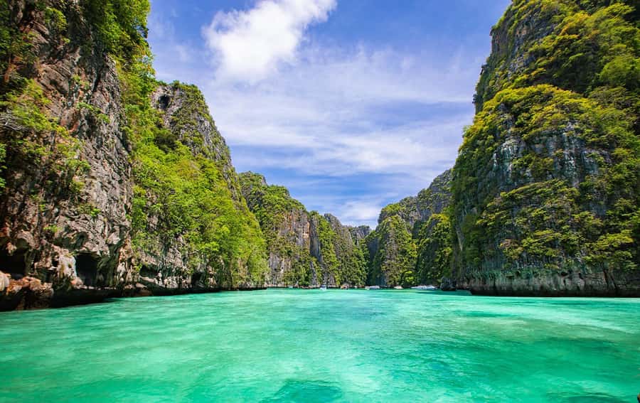 Phi Phi: Full-Day Phi Phi Islands & Sunset Tour by Speedboat - Shark Point and Rantee Bay put the water first