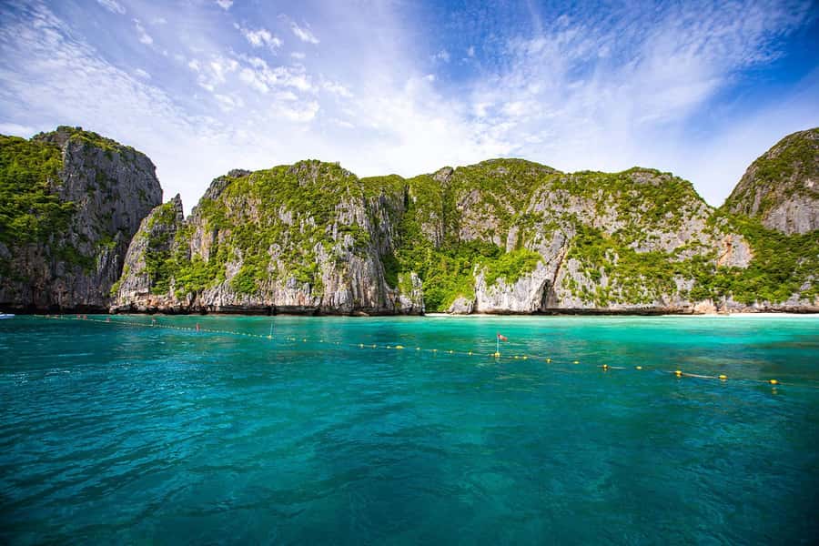 Phi Phi: Full-Day Phi Phi Islands & Sunset Tour by Speedboat - Pi Leh Lagoon is the calm-water highlight