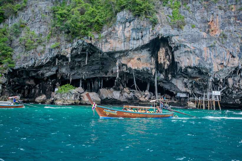 Phi Phi: Sunset and Plankton by Speed Boat with Snorkeling - Pileh Lagoon: clear water beneath steep cliffs