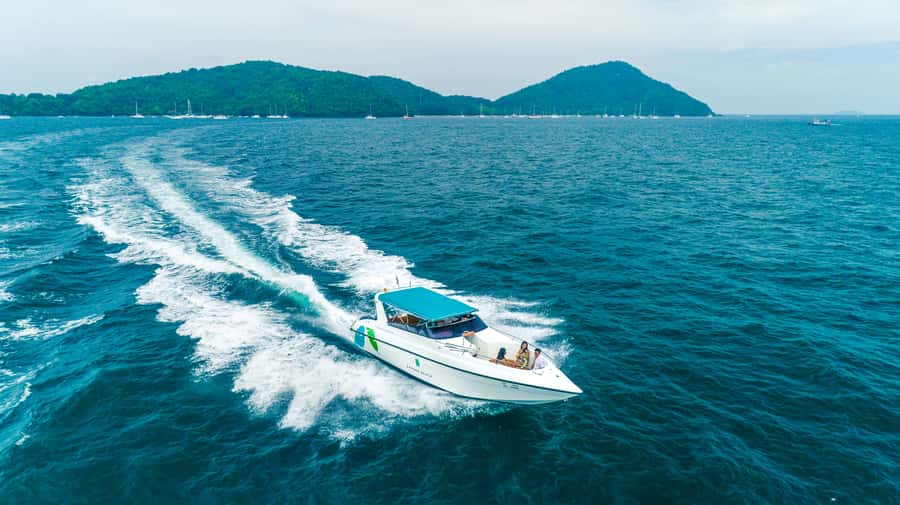 Phuket: Banana Beach Speedboat Island Experience with Lunch - Snorkeling and swimming in clear water