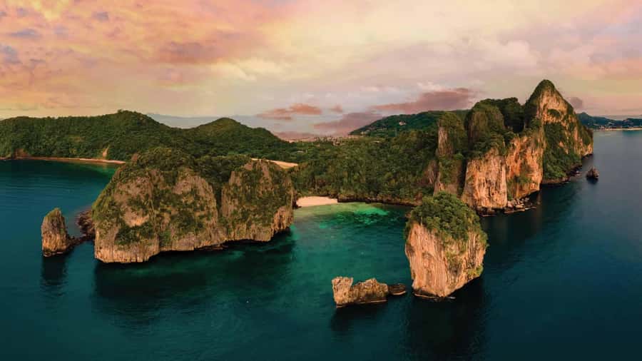 Phuket: Phi Phi Island Sunrise Group Speedboat Tour - Maya Bay: famous, beautiful, and carefully managed