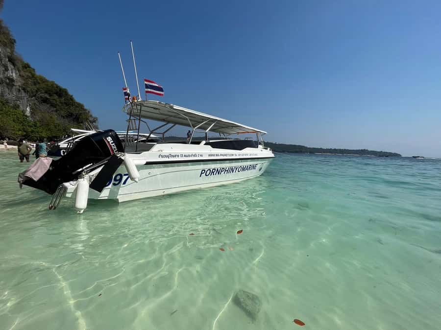 Phuket: Phi Phi & Kai Island Private Speed Boat Tour - Snorkeling and fish feeding around Phi Phi Ley