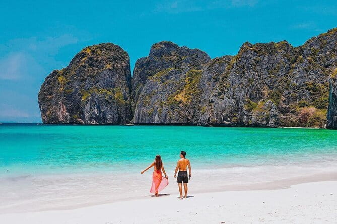 Phuket Speedboat Day Tour to Phi Phi & Maya Bay Highlights - Loh Sama Bay and Maya Bay: famous scenery with real crowds