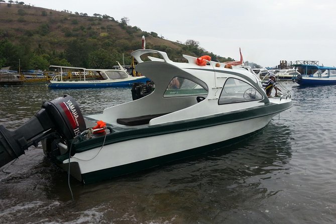 Pick up in Lombok islands & transfer to the Gilis by Speedboat - Boarding the speedboat at Teluk Nare