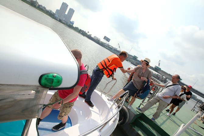 Private Cu Chi Tunnels tour by Luxury Speedboat - Crawling through a narrow tunnel