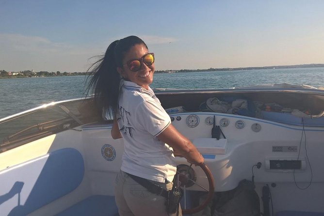 Private Romantic Motorboat Tour From Sirmione - Privacy, music, and the lack of detailed commentary